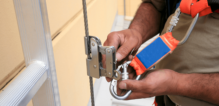 Protect workers from falls on fixed ladders Protect workers from falls on fixed ladders